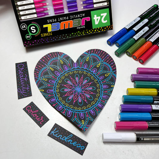 MANDALA PAINTING WITH JEWEL TONE PAINT PENS ON BLACK PAPER